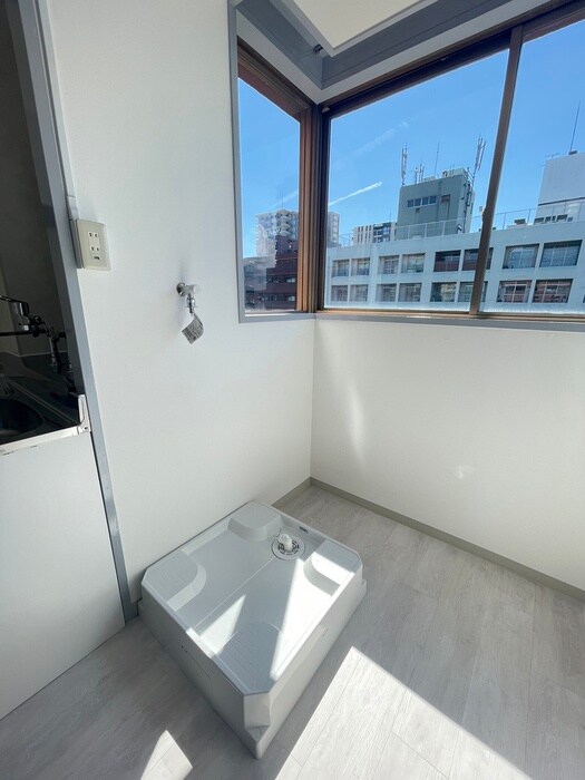 物件内観写真11　(洗濯機置場)