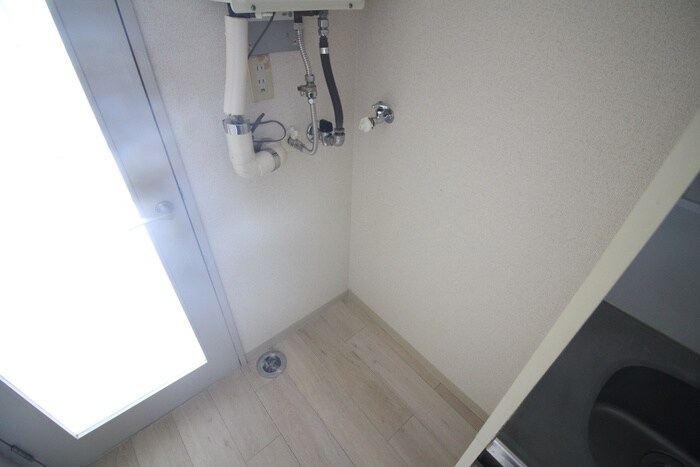 物件内観写真11　(洗濯機置場)