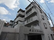 近鉄難波線・奈良線 富雄駅 4階建 築39年の外観写真