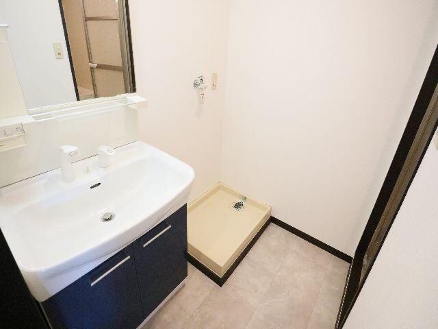 生駒駅 バス7分　松美台下車：停歩1分 1階の洗面・脱衣所