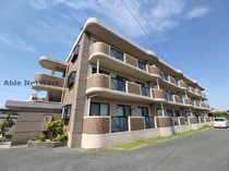 熊本市営バス 長嶺四ツ角 3階建 築23年の外観写真