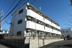 外観（重量鉄骨造３階建てマンション）