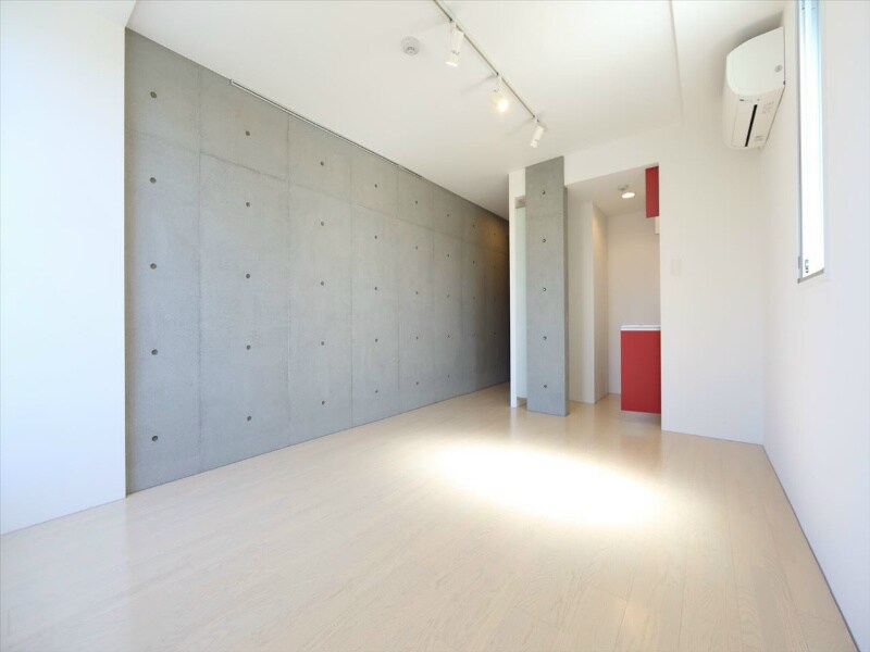 物件内観写真21　(洋室9.54帖　内装コンクリート打ちっぱなし)