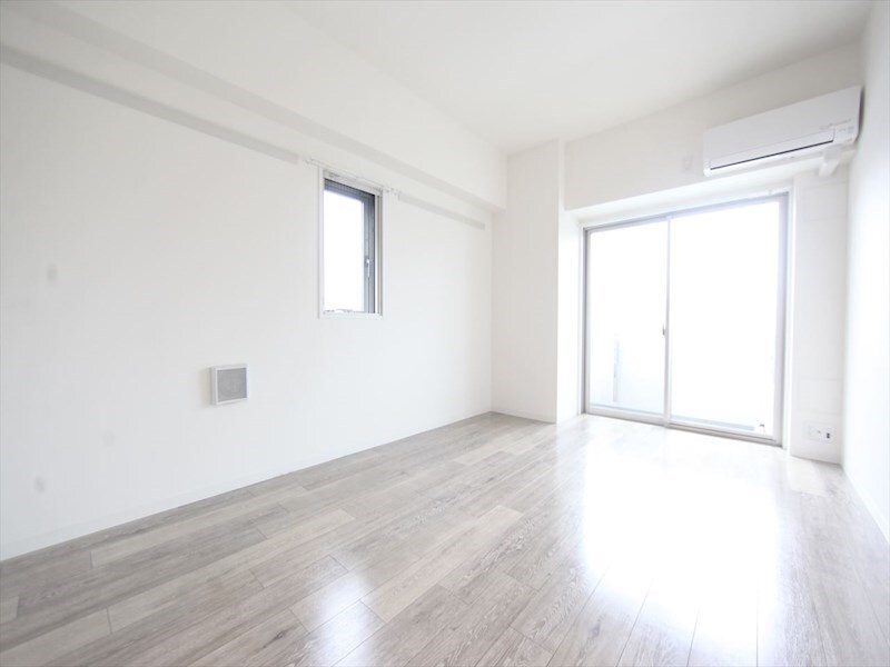 物件内観写真14　(洋室9.1帖　2面採光　エアコン完備　南面バルコニー)