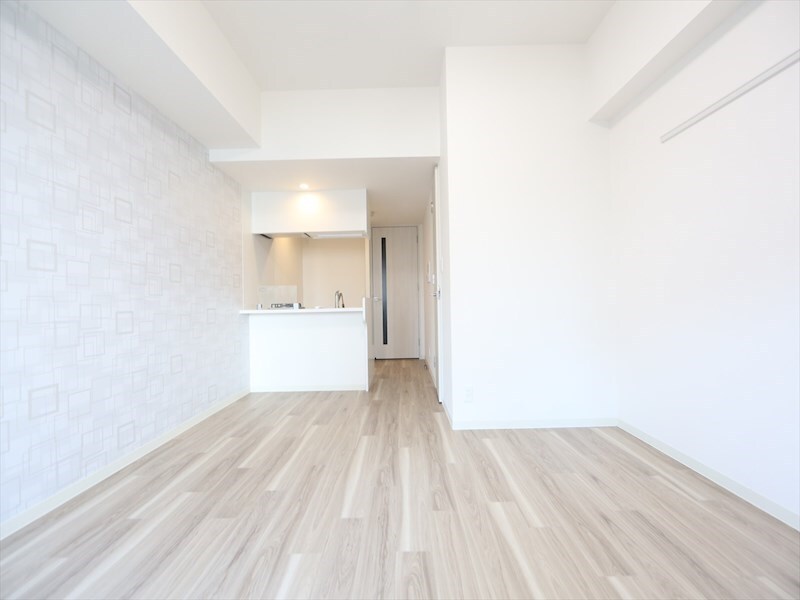 物件内観写真9　(洋室11.6帖　カウンターキッチン　ウォークインクローゼット)