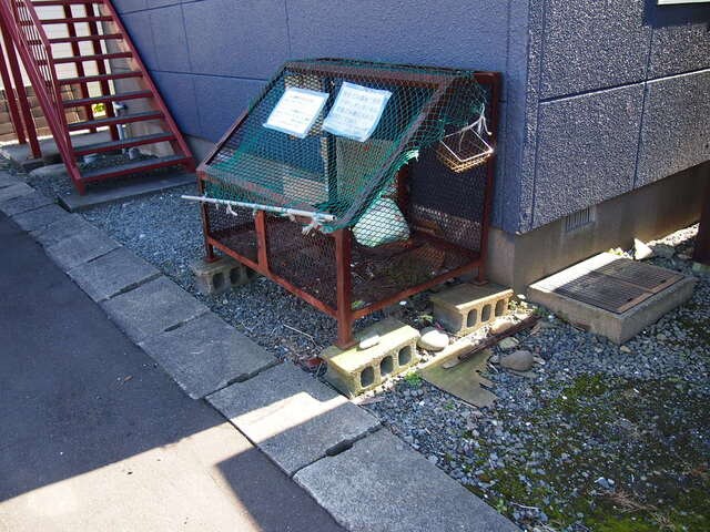 物件外観写真3　(敷地内ゴミ集積場)