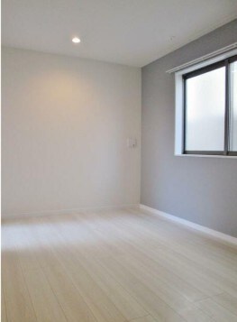 物件内観写真2　(6.4帖のきれいな洋室。)