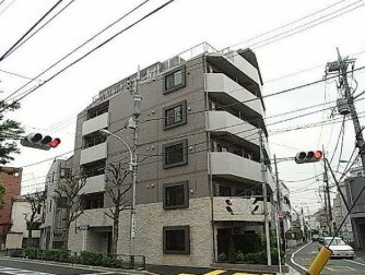 物件外観写真1　(外観タイル張りのマンション。)