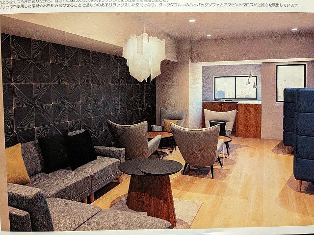 物件外観写真2　(2Fのコミュニティスペースの完成予想図。ワークスペースや来客)