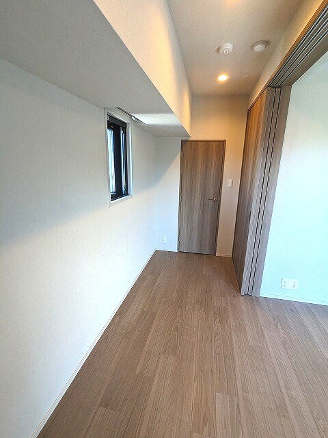 物件内観写真20　(DKと3.8帖洋室のスライドドアを広げて12.4帖のリビング)