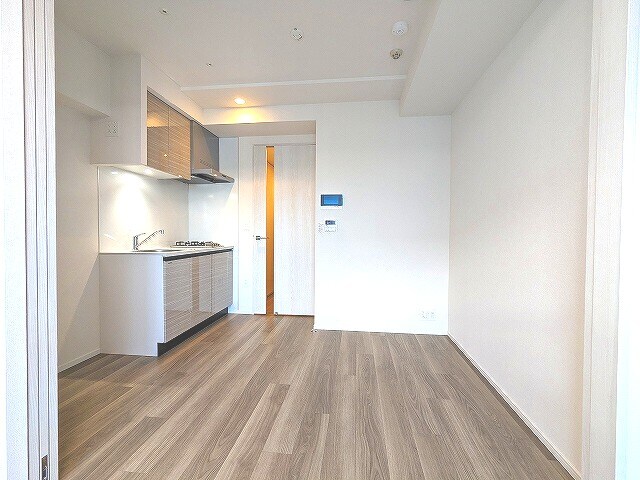 物件内観写真12　(ダイニングと洋室を広げて開放感ある空間です)