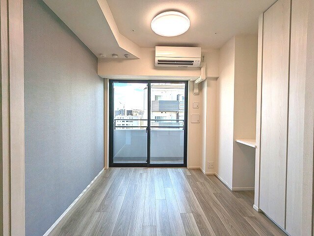 物件内観写真13　(ダイニングと洋室を広げて開放感ある空間です)