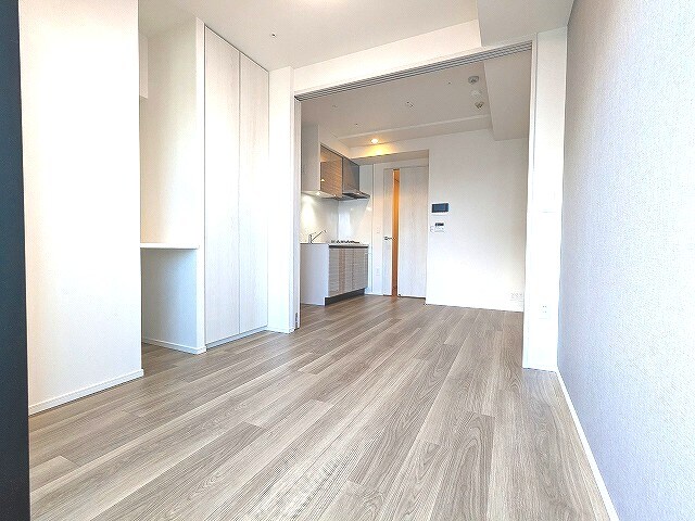 物件内観写真25　(ダイニングと洋室を広げて開放感ある空間です)