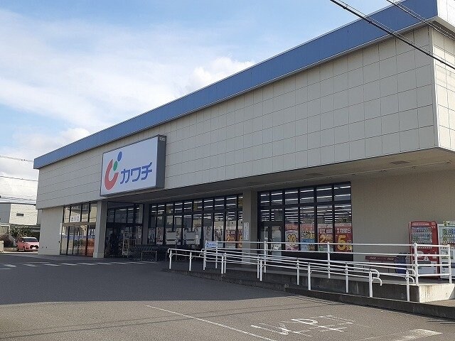 物件外観写真5　(カワチ薬品 鶴田北店まで1100m)