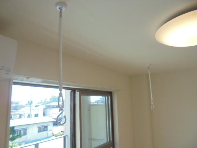 物件内観写真26　(室内物干し)
