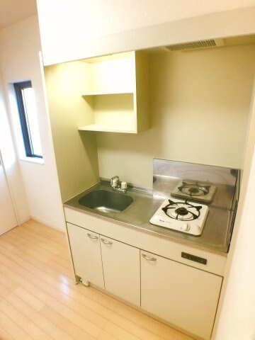 物件内観写真7　(使いやすいキッチンには1口のコンロ付き★写真は205号室の写)