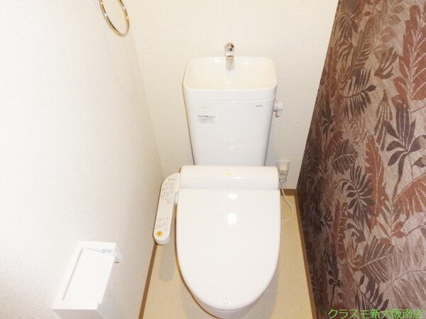 トイレ(ポイントクロス採用で落ち着きのある空間に～)