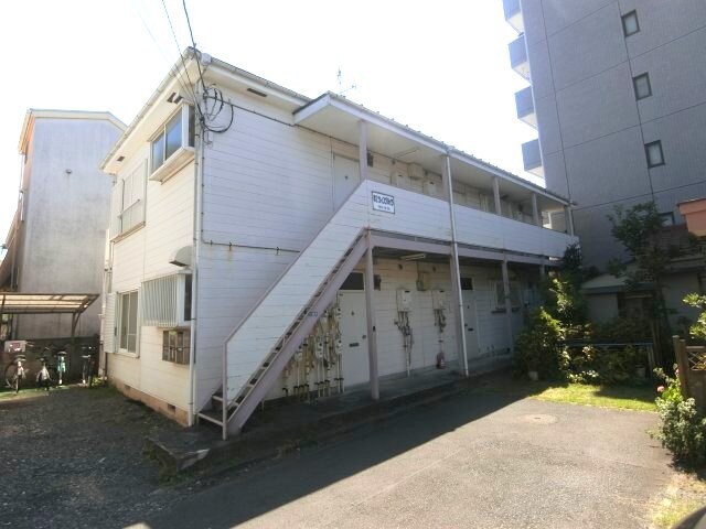 物件外観写真1　(苅宿商店街徒歩1分で生活便利♪)