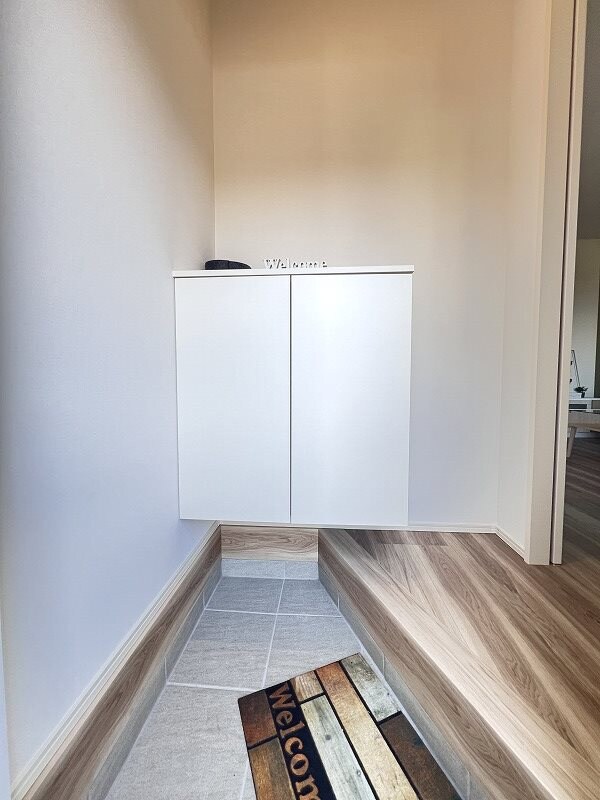 メゾングレイス上津の玄関