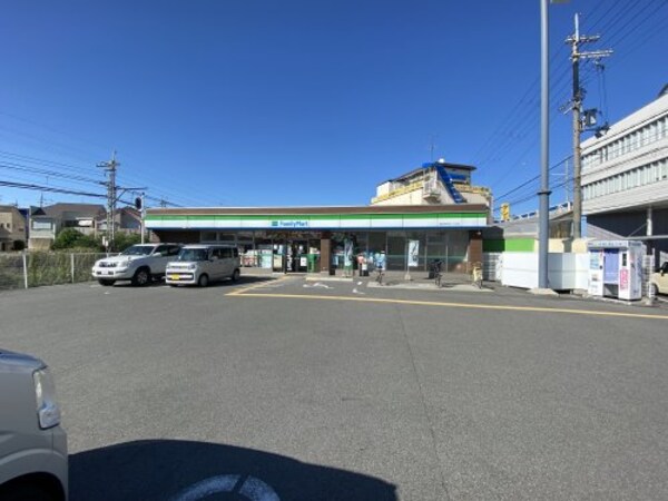 周辺環境(ファミリーマート 富田林甲田一丁目店 884m)