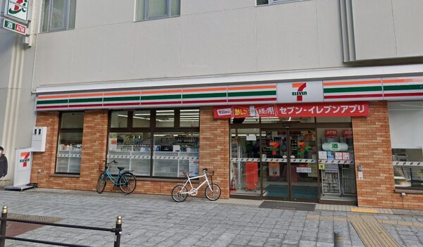 周辺環境(セブンイレブン 大阪南堀江1丁目店 445m)