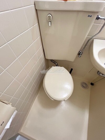 物件内観写真10　(敷地内コインランドリー)