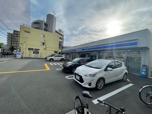 周辺環境(ローソン ドラッグシグマ八尾本町店 150m)