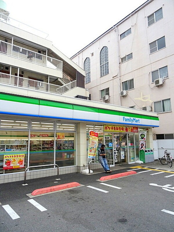 周辺環境(ファミリーマート 西成松店 895m)
