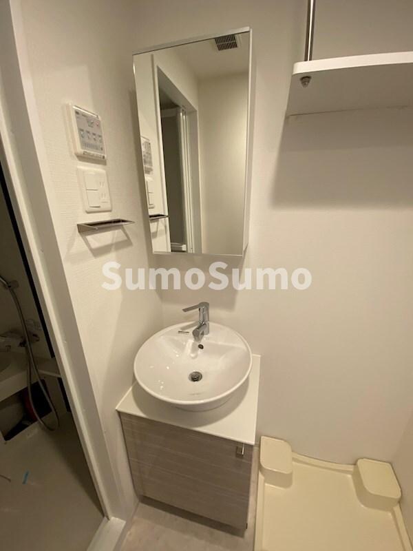 洗面・脱衣所(ゆったりとスペースのある洗面所)