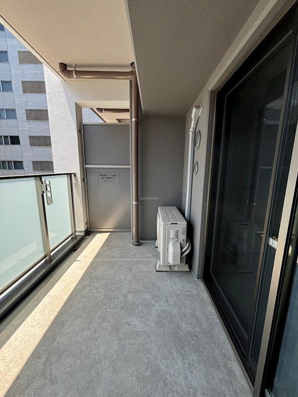 物件内観写真9　(暖かな日差しのふりそそぐバルコニー)