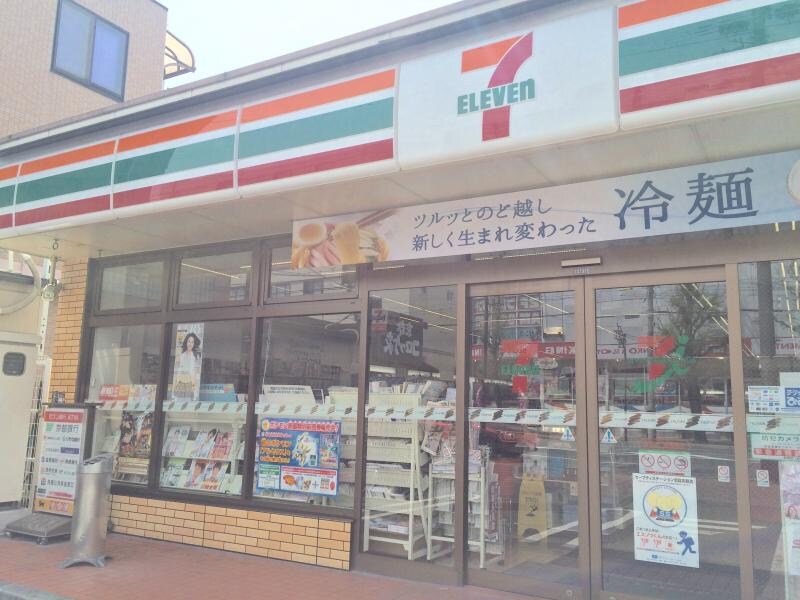 物件外観写真3　(セブンイレブン JR西大路駅前店（487m）)