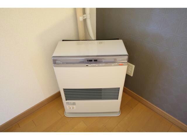 物件内観写真19　(灯油ストーブ)
