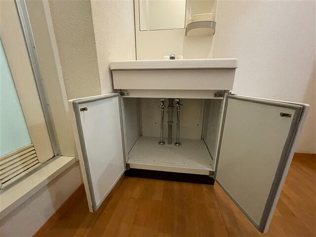 物件内観写真12　(洗面台下収納)
