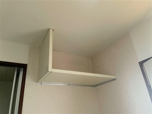 物件内観写真13　(洗濯機置場収納)