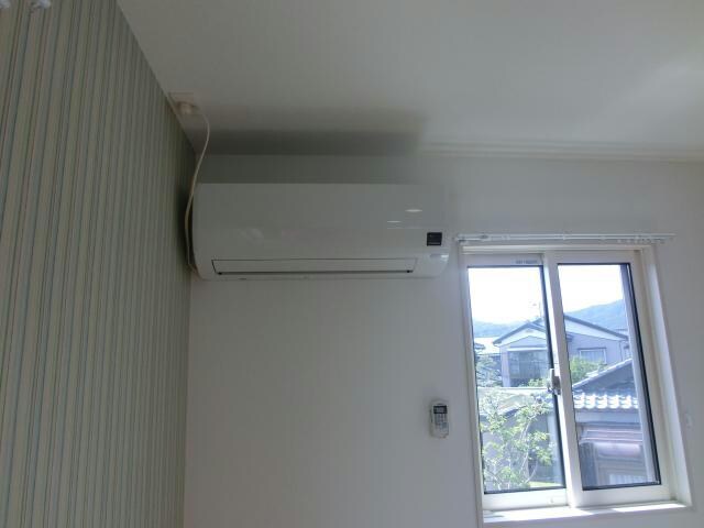 物件内観写真20　(リビングエアコン)
