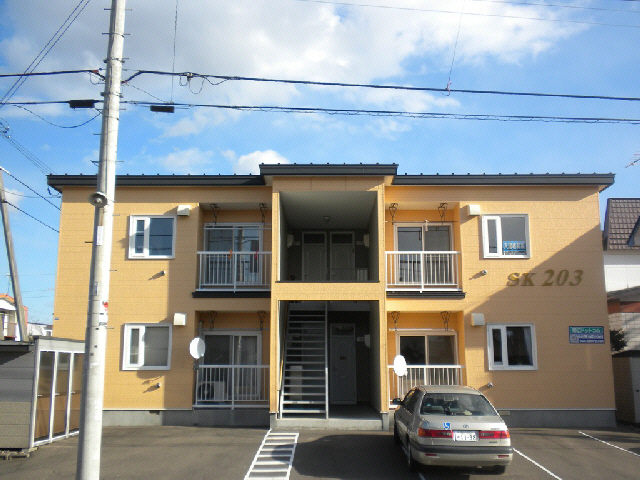 SK203
