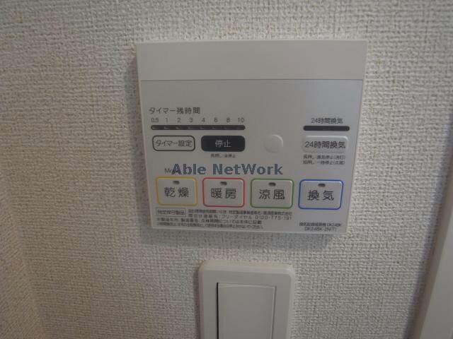 物件内観写真23　(浴室乾燥機リモコン)