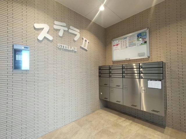 物件外観写真13　(エントランス防犯カメラ付)