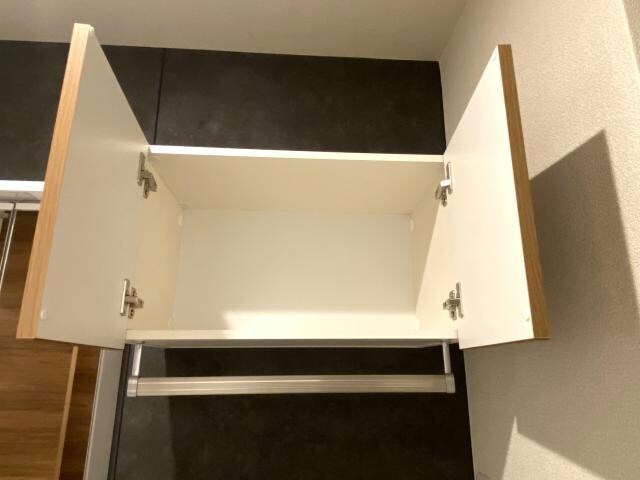 物件内観写真25　(脱衣所収納)