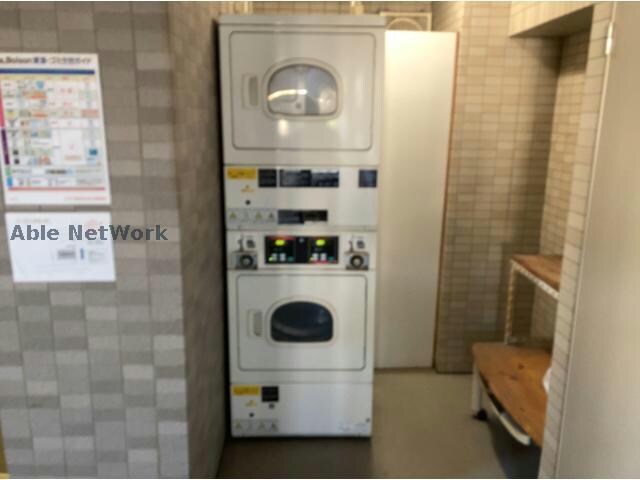 物件外観写真4　(共用乾燥機（入居者専用）)