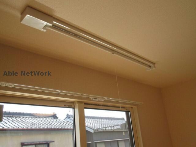 物件内観写真10　(室内物干し)