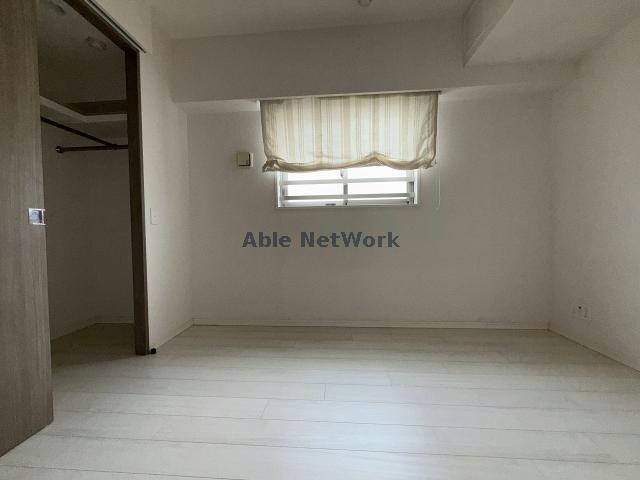 物件内観写真22　(キッチン側洋室)