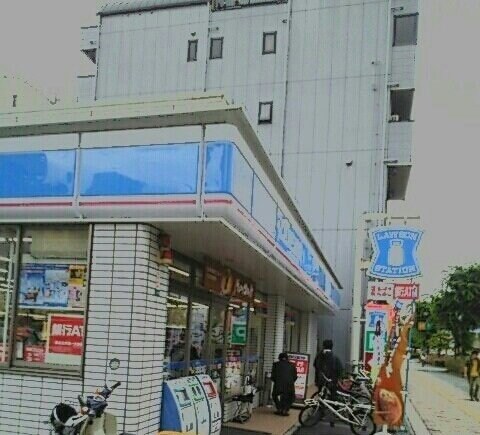 物件外観写真7　(ローソンさんまで1060m)