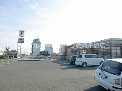 物件外観写真9　(セブンーイレブン岡山白石店 633m)