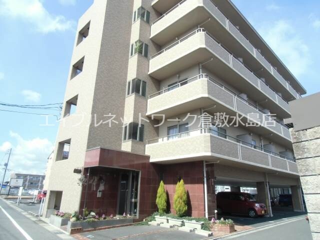 物件外観写真1　(外観タイル張りのモダンな造り)