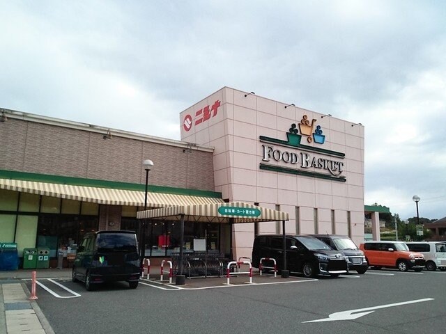 物件外観写真4　(ニシナ　児島柳田店まで850m)