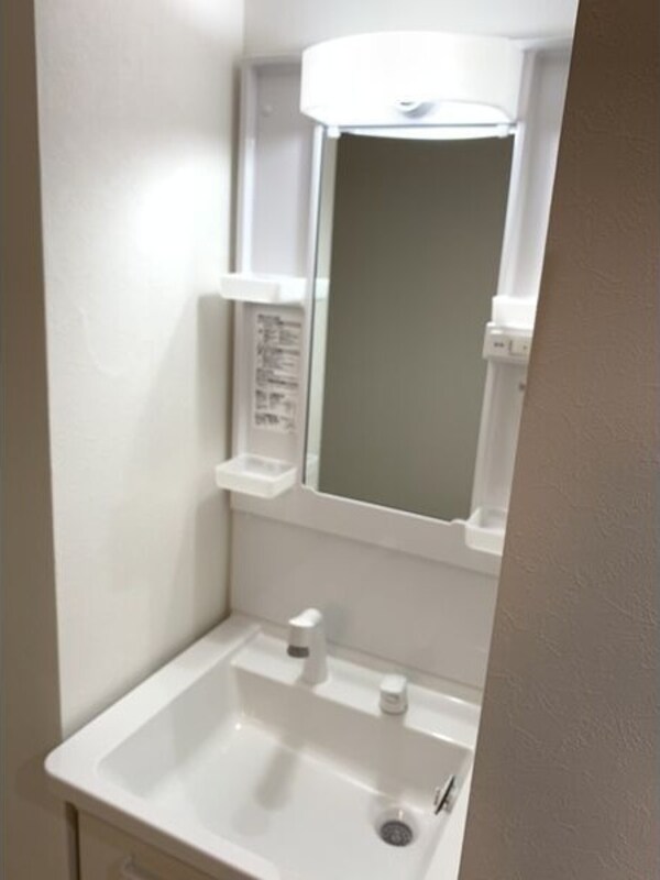 洗面・脱衣所(※写真は同じマンションの違う部屋のものになります。)