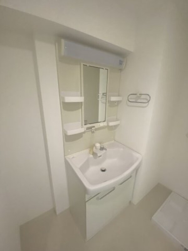 洗面・脱衣所(※写真は同じマンションの違う部屋のものになります。)