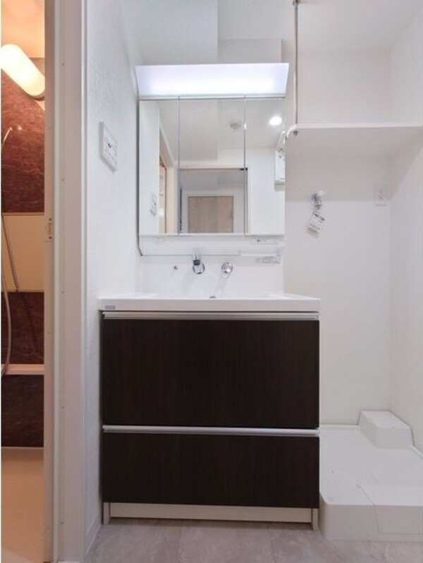 洗面・脱衣所(※写真は同じマンションの違う部屋のものになります。)