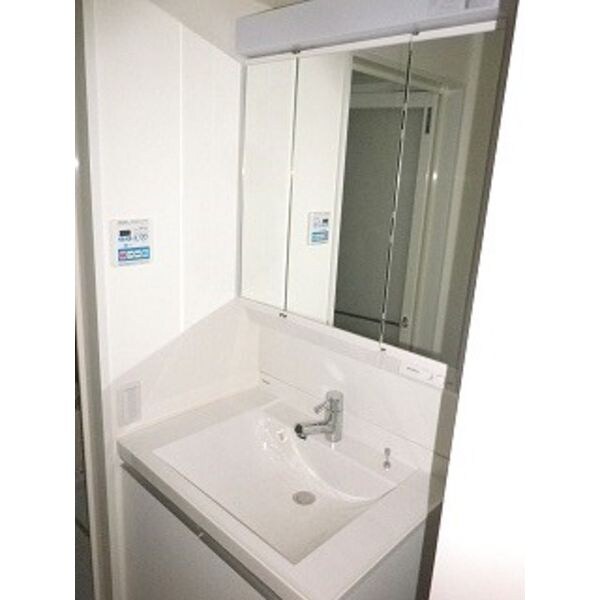 洗面・脱衣所(※写真は同じマンションの違う部屋のものになります。)